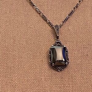 Vintage signed hematite 935 pendant on a 925 Sterling silver Italian chain